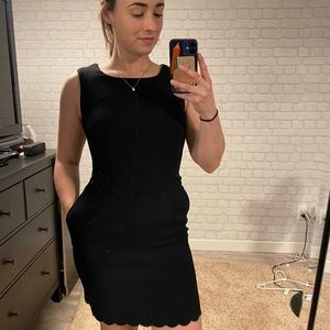 Black scalloped dress with pockets